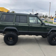Illustration for article titled At $4,999, Does This Raised Up 1996 Jeep Cherokee Come With a Jacked Up Price?em/em